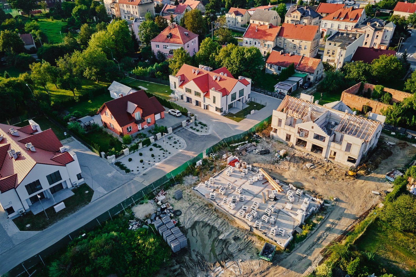 Aerial view of residential area with houses under construction